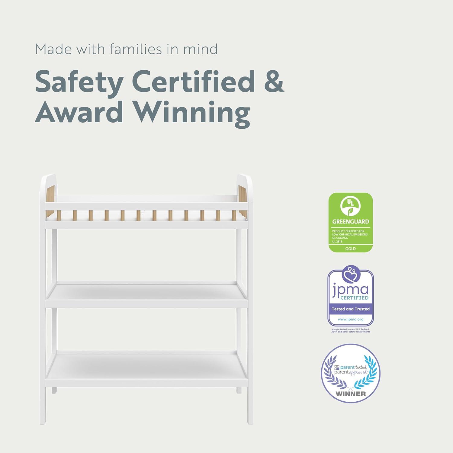 imageStorkcraft Pasadena Changing Table with WaterResistant Changing Pad Driftwood GREENGUARD Gold Certified Includes Bonus WaterResistant Changing Pad with Safety Strap 2 Open ShelvesWhite with Driftwood