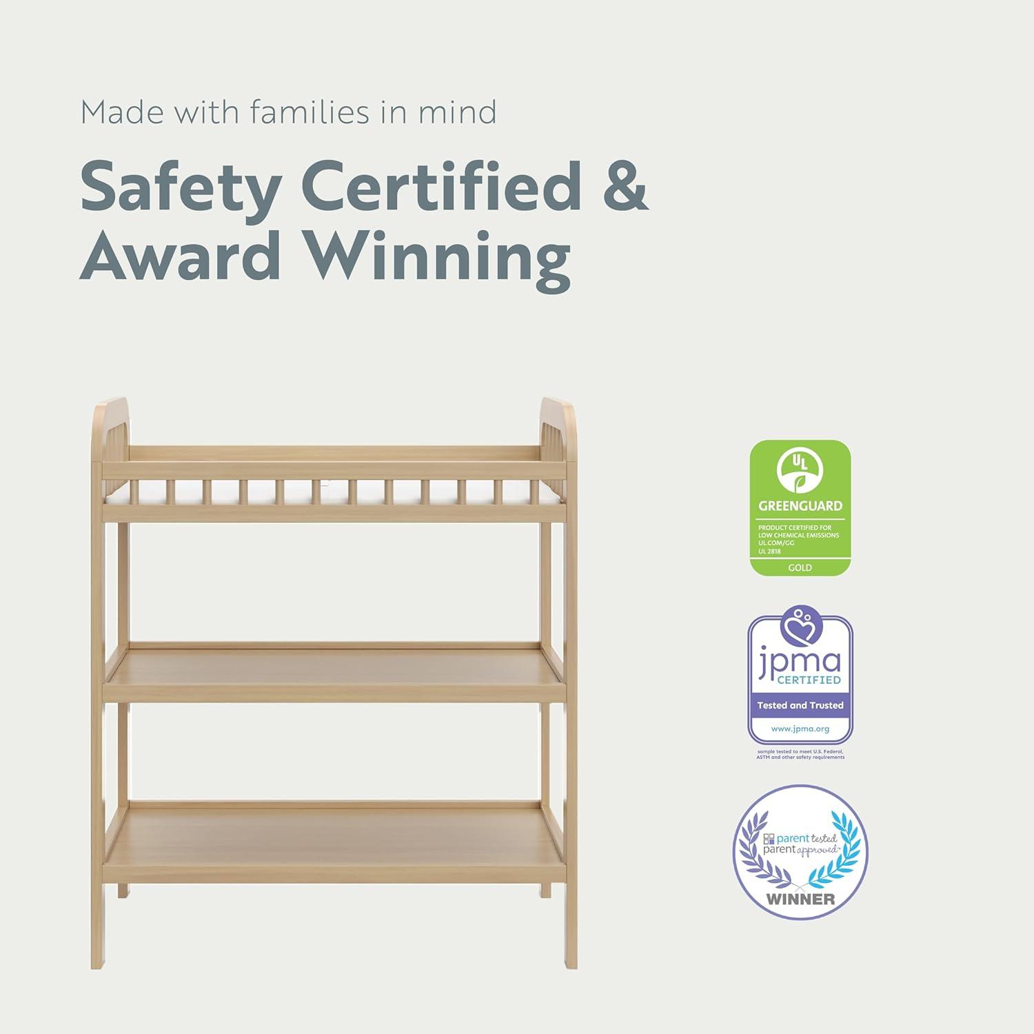 imageStorkcraft Pasadena Changing Table with WaterResistant Changing Pad Driftwood GREENGUARD Gold Certified Includes Bonus WaterResistant Changing Pad with Safety Strap 2 Open ShelvesDriftwood