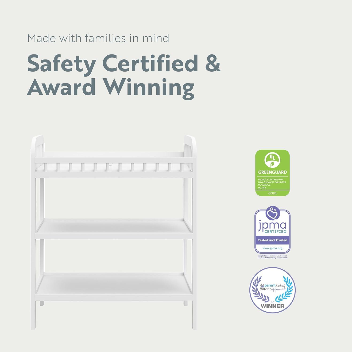 imageStorkcraft Pasadena Changing Table with WaterResistant Changing Pad Driftwood GREENGUARD Gold Certified Includes Bonus WaterResistant Changing Pad with Safety Strap 2 Open ShelvesWhite