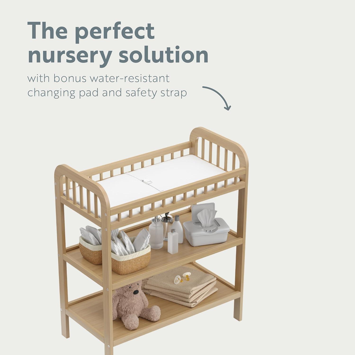 imageStorkcraft Pasadena Changing Table with WaterResistant Changing Pad Driftwood GREENGUARD Gold Certified Includes Bonus WaterResistant Changing Pad with Safety Strap 2 Open ShelvesDriftwood