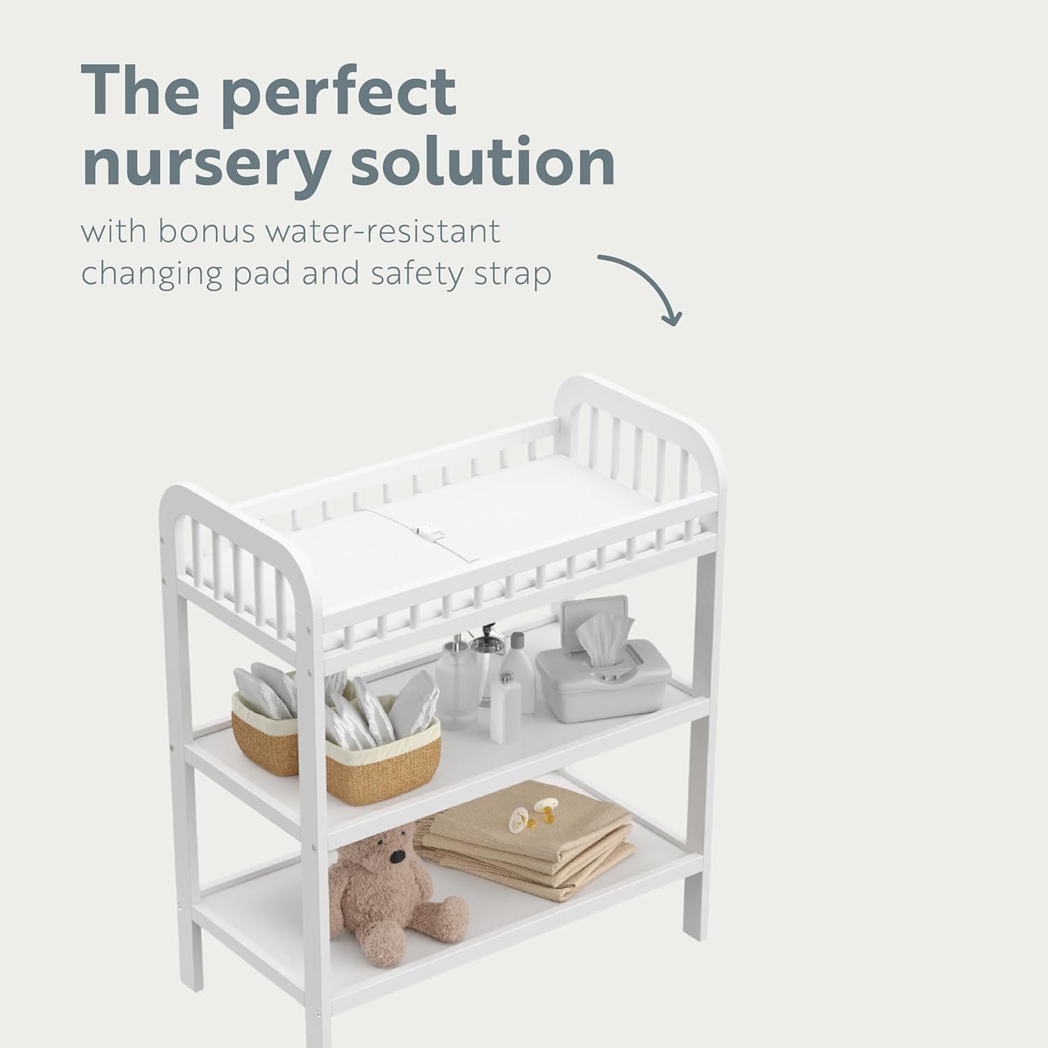 imageStorkcraft Pasadena Changing Table with WaterResistant Changing Pad Driftwood GREENGUARD Gold Certified Includes Bonus WaterResistant Changing Pad with Safety Strap 2 Open ShelvesWhite