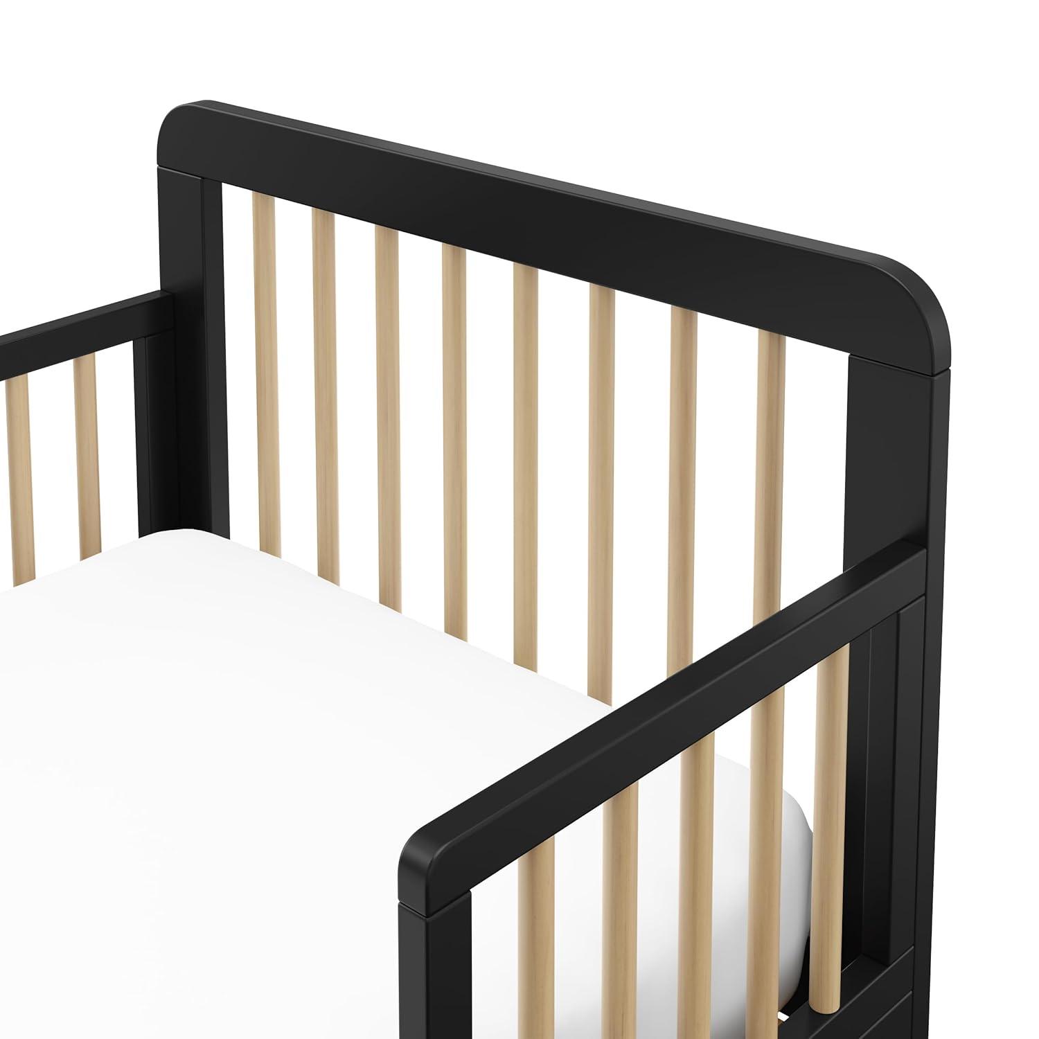 imageStorkcraft Pasadena Toddler Bed White with Driftwood GREENGUARD Gold Certified Fits Standard FullSize Crib ampamp Toddler Mattress Toddler Safety Guardrails Included Complete Design with FootboardBlack Driftwood