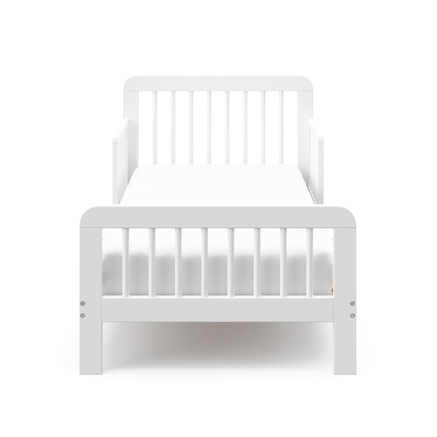 imageStorkcraft Pasadena Toddler Bed White with Driftwood GREENGUARD Gold Certified Fits Standard FullSize Crib ampamp Toddler Mattress Toddler Safety Guardrails Included Complete Design with FootboardWhite