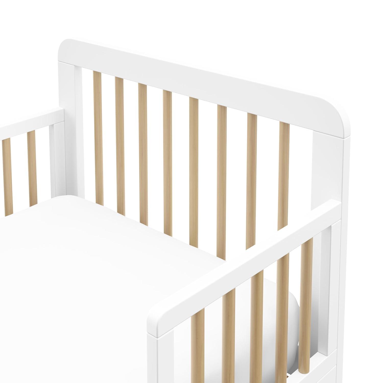 imageStorkcraft Pasadena Toddler Bed White with Driftwood GREENGUARD Gold Certified Fits Standard FullSize Crib ampamp Toddler Mattress Toddler Safety Guardrails Included Complete Design with FootboardWhite With Driftwood