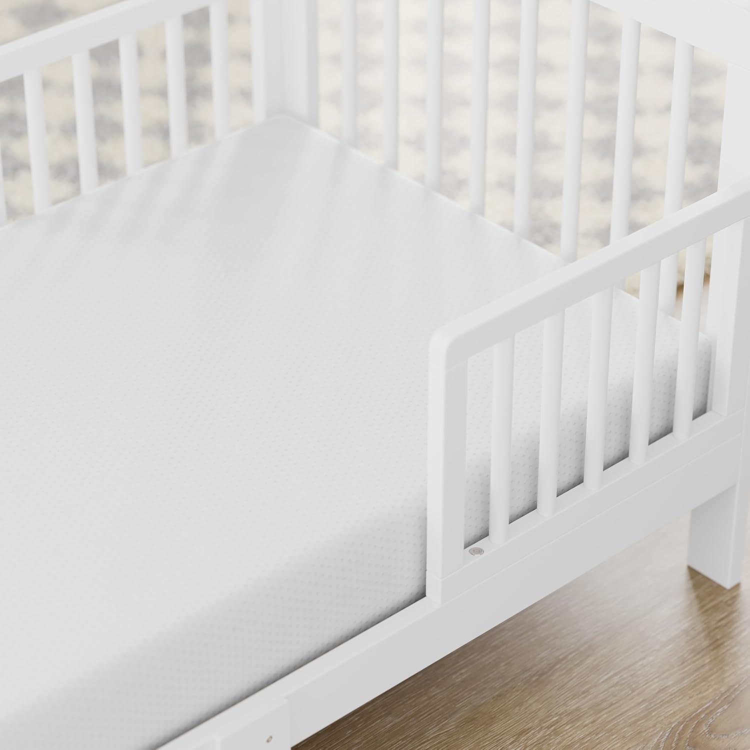 imageStorkcraft Pasadena Toddler Bed White with Driftwood GREENGUARD Gold Certified Fits Standard FullSize Crib ampamp Toddler Mattress Toddler Safety Guardrails Included Complete Design with FootboardWhite
