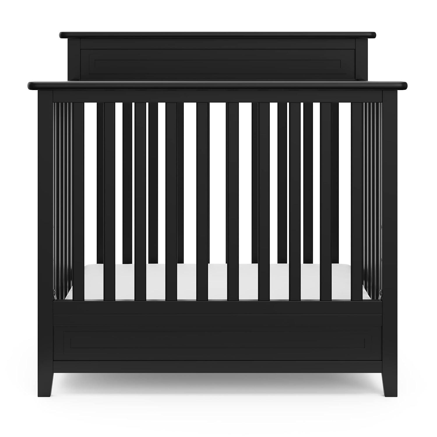 imageStorkcraft Petal 4in1 Convertible Mini Crib White GREENGUARD Gold Certified Converts to Daybed and TwinSize Bed Bonus 275inch Mini Crib Mattress Included Ideal for Small SpacesBlack