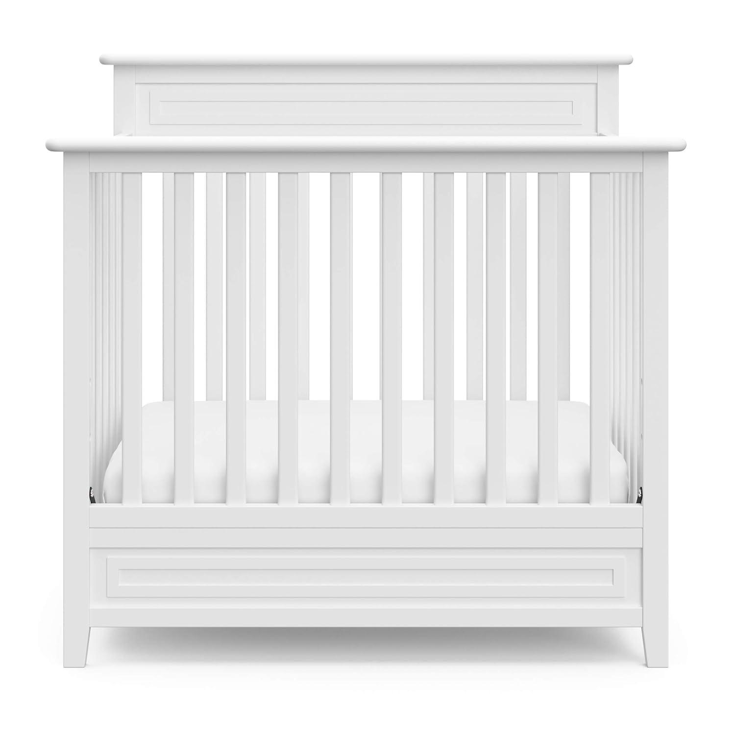 imageStorkcraft Petal 4in1 Convertible Mini Crib White GREENGUARD Gold Certified Converts to Daybed and TwinSize Bed Bonus 275inch Mini Crib Mattress Included Ideal for Small SpacesWhite