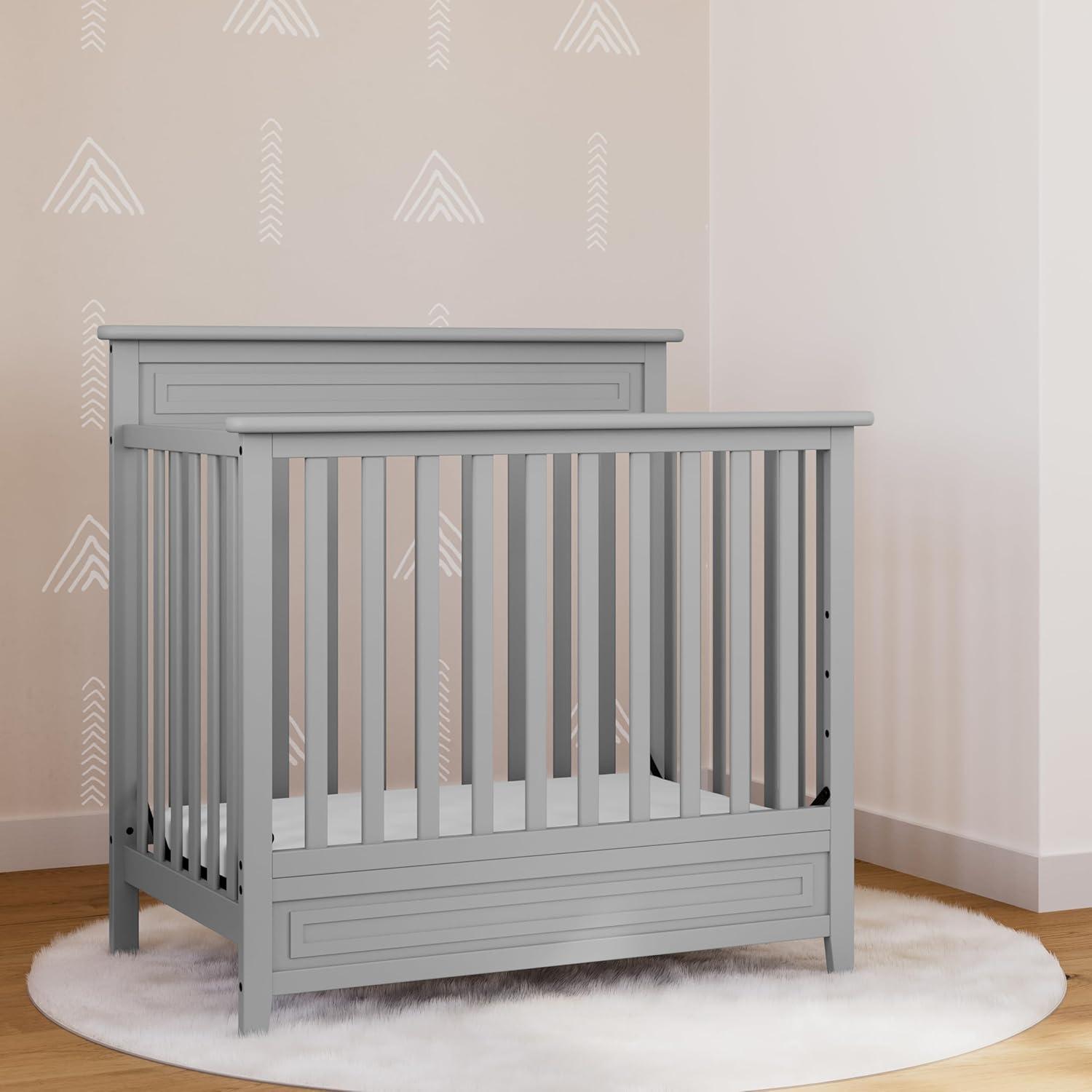 imageStorkcraft Petal 4in1 Convertible Mini Crib White GREENGUARD Gold Certified Converts to Daybed and TwinSize Bed Bonus 275inch Mini Crib Mattress Included Ideal for Small SpacesPebble Gray