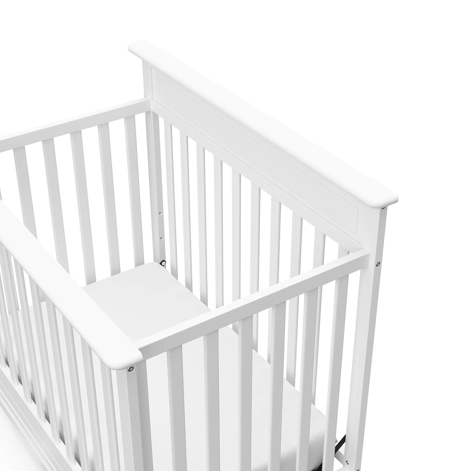 imageStorkcraft Petal 4in1 Convertible Mini Crib White GREENGUARD Gold Certified Converts to Daybed and TwinSize Bed Bonus 275inch Mini Crib Mattress Included Ideal for Small SpacesWhite