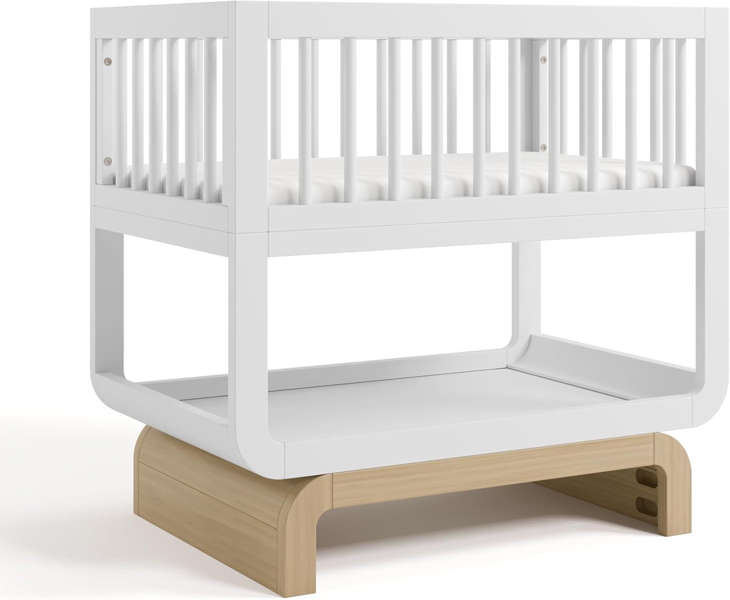 imageStorkcraft Santorini Deluxe 3in1 Convertible Bassinet Frosted Oat with Driftwood GREENGUARD Gold Certified Wood Baby Bassinet Includes WaterResistant Mattress Converts to Toy Box and BookcaseWhite With Driftwood