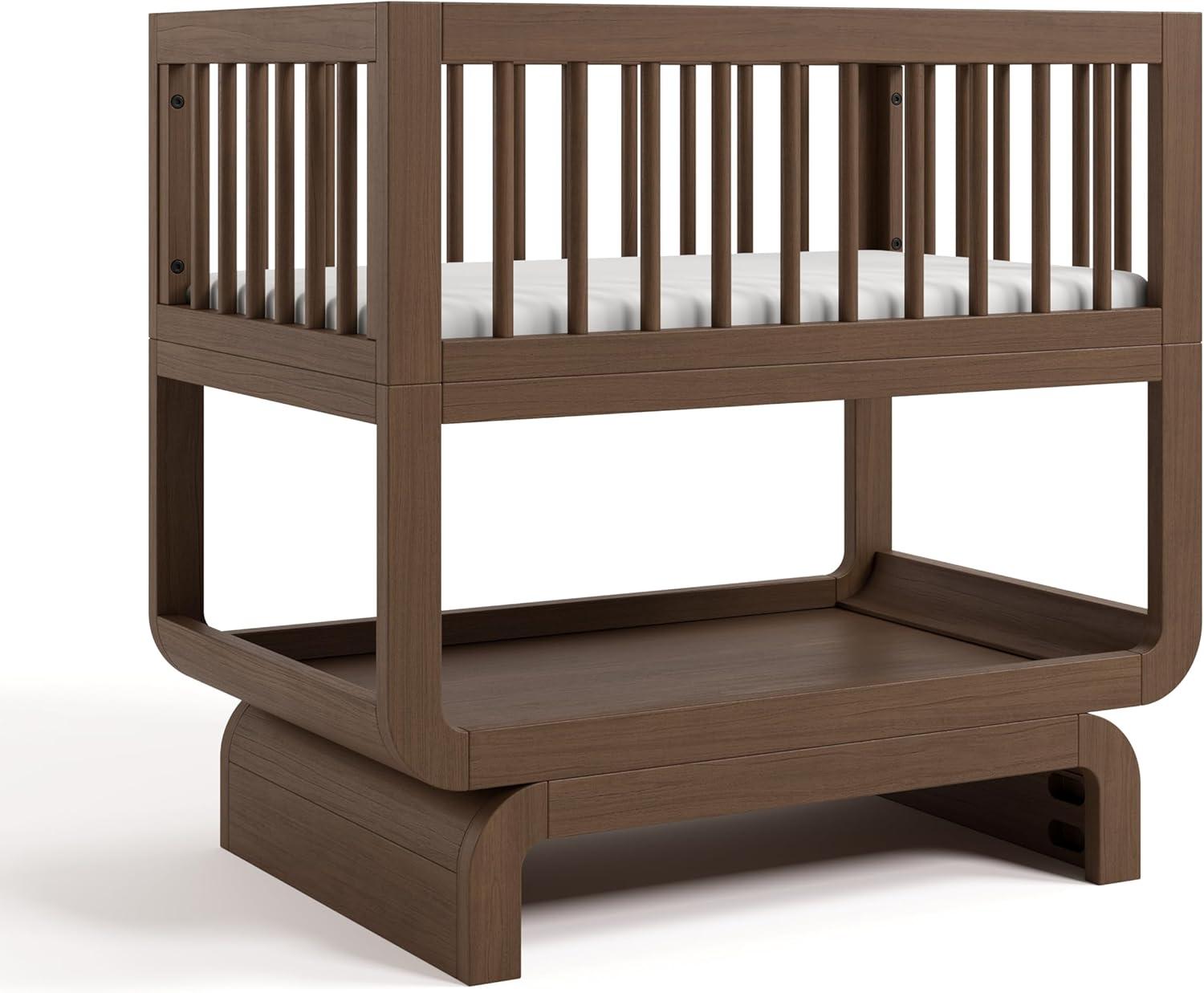 imageStorkcraft Santorini Deluxe 3in1 Convertible Bassinet Frosted Oat with Driftwood GREENGUARD Gold Certified Wood Baby Bassinet Includes WaterResistant Mattress Converts to Toy Box and BookcaseHazelnut