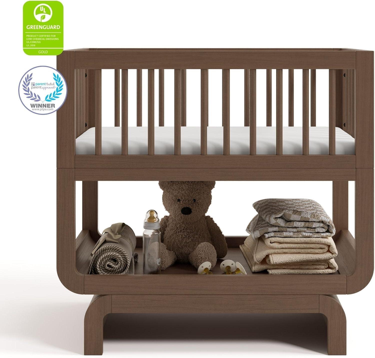 imageStorkcraft Santorini Deluxe 3in1 Convertible Bassinet Frosted Oat with Driftwood GREENGUARD Gold Certified Wood Baby Bassinet Includes WaterResistant Mattress Converts to Toy Box and BookcaseHazelnut