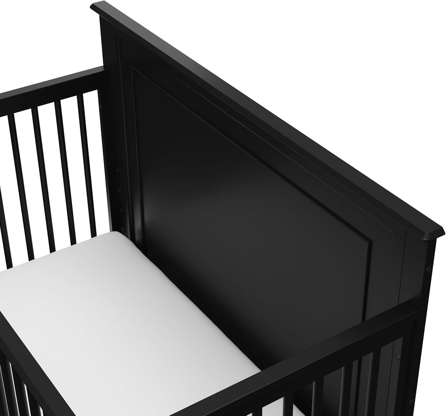 imageStorkcraft Solstice 5In1 Convertible Crib White GREENGUARD Gold Certified Converts to Toddler Bed and FullSize Bed Fits Standard FullSize Crib Mattress Adjustable Mattress Support BaseBlack