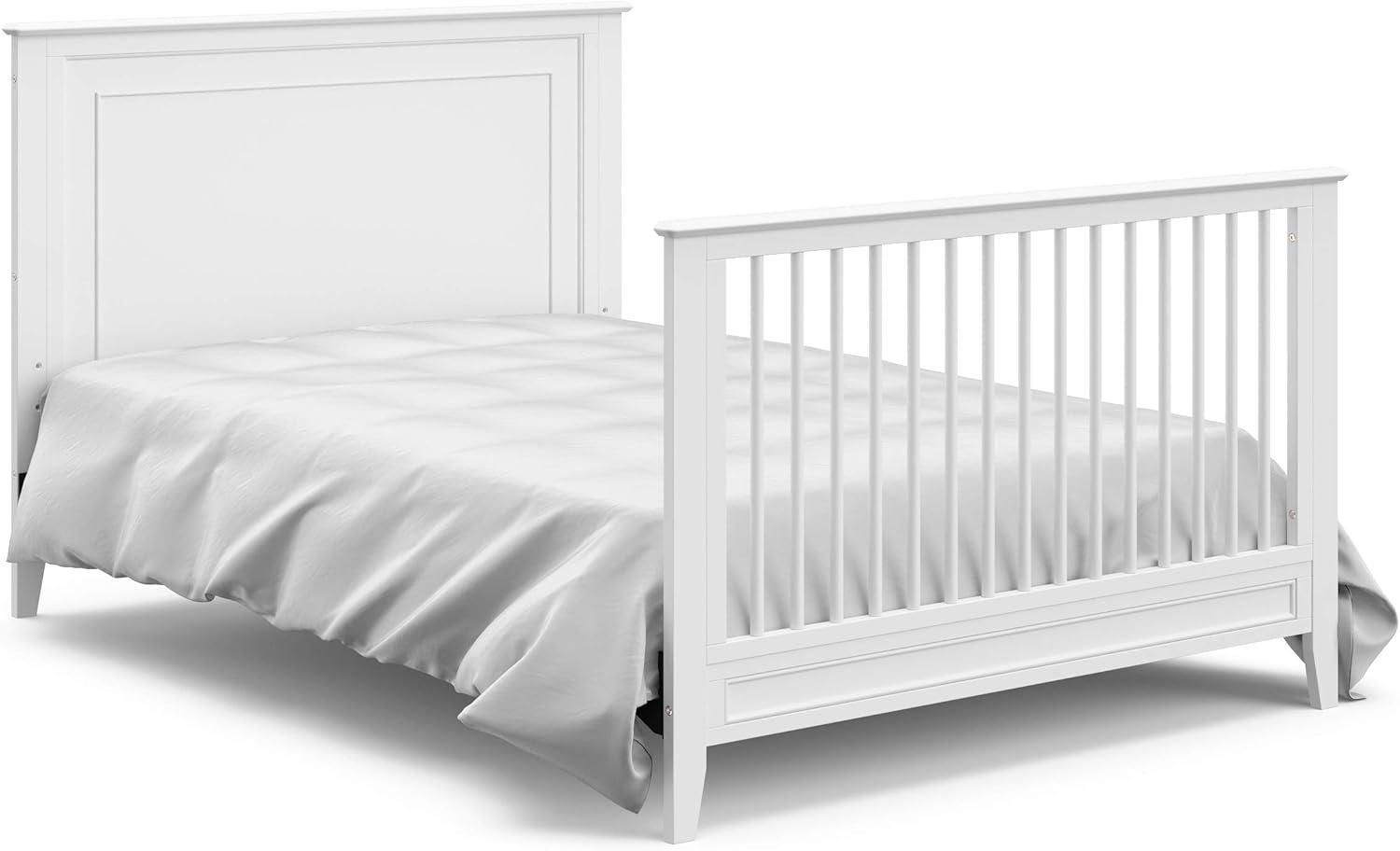imageStorkcraft Solstice 5In1 Convertible Crib White GREENGUARD Gold Certified Converts to Toddler Bed and FullSize Bed Fits Standard FullSize Crib Mattress Adjustable Mattress Support BaseWhite