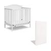 imageGraco Stella 4in1 Convertible Mini Crib with Bonus Mattress White  Includes Bonus 275 Inch Thick Mattress with WaterResistant Cover Converts to Twin Bed Ideal Crib for Small SpacesWhite