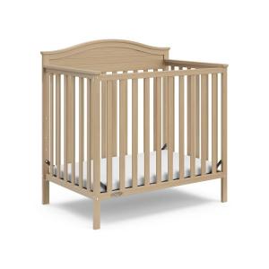 Graco Stella 4-in-1 Convertible Mini Crib with Bonus Mattress (White) – Includes Bonus 2.75 Inch Thick Mattress with Water-Resistant Cover, Converts to Twin Bed, Ideal Crib for Small Spaces(Driftwood)